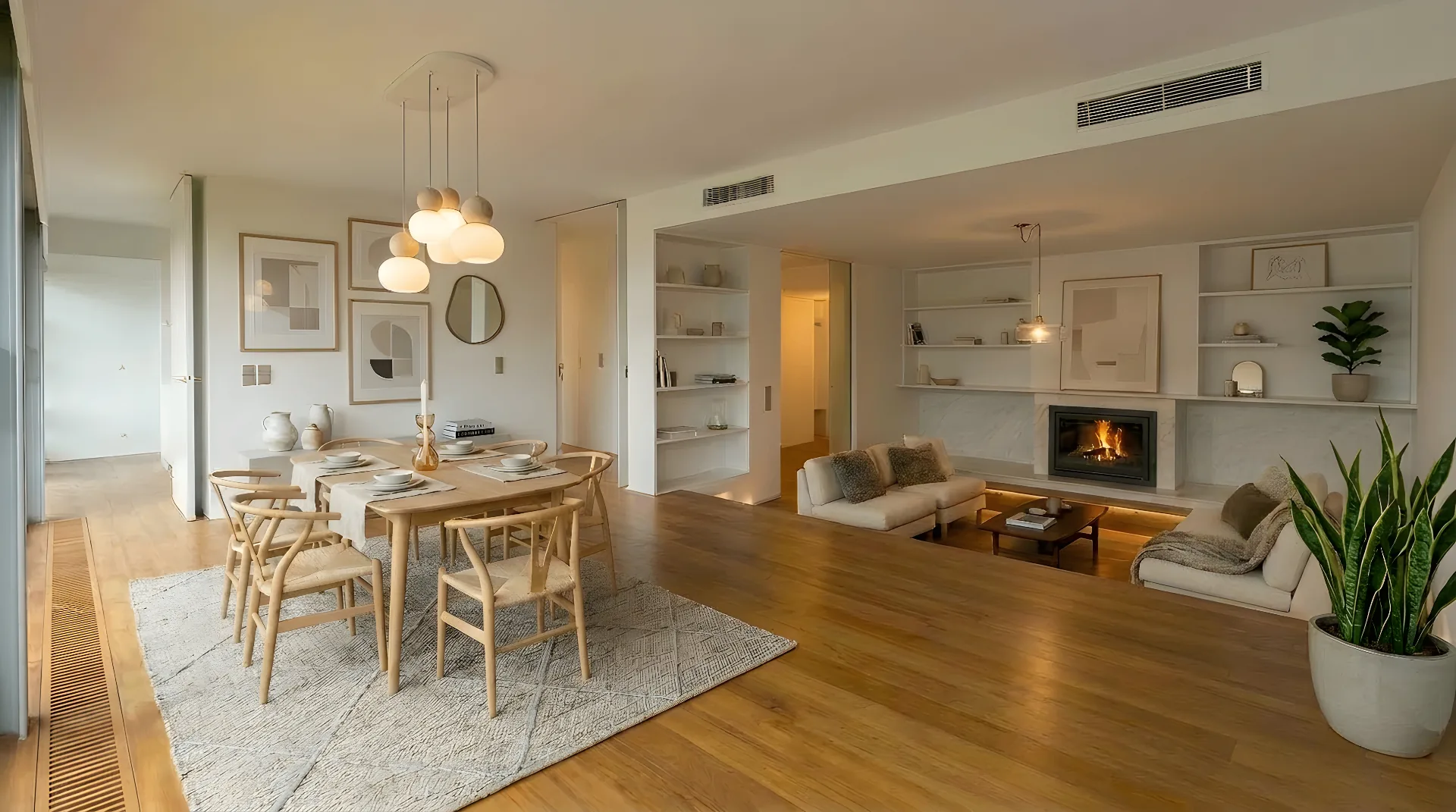 Spacious living room with fireplace and dining area